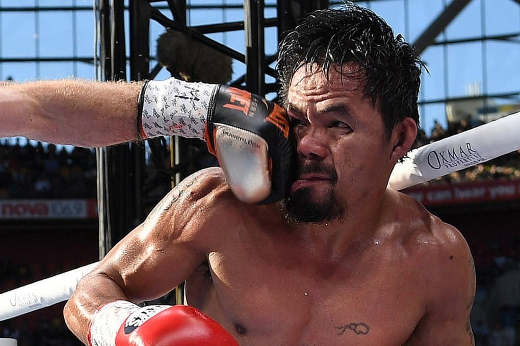 Manny Pacquiao is struck by Jeff Horn in Brisbane. Photo: EPA