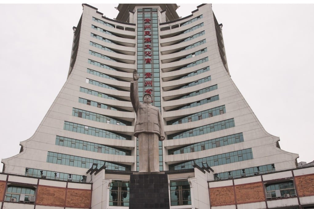 A statue of Mao Zedong is pictured on the People's Square in Guiyang, capital city of northwest China's Guizhou province. The city is being developed as a new hi-tech hub. Photo: Simon Song