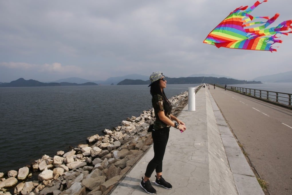 Kite-flying is a popular activity at Plover Cove Reservoir. A changing climate and rainfall patterns heighten the need for increasing the local storage capacity of water. Photo: Sam Tsang