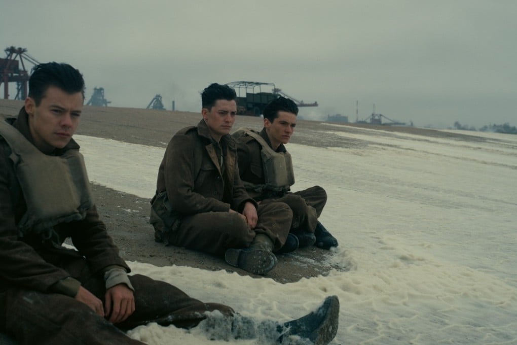 From left: Harry Styles, Aneurin Barnard and Fionn Whitehead in the film Dunkirk, written and directed by Christopher Nolan.