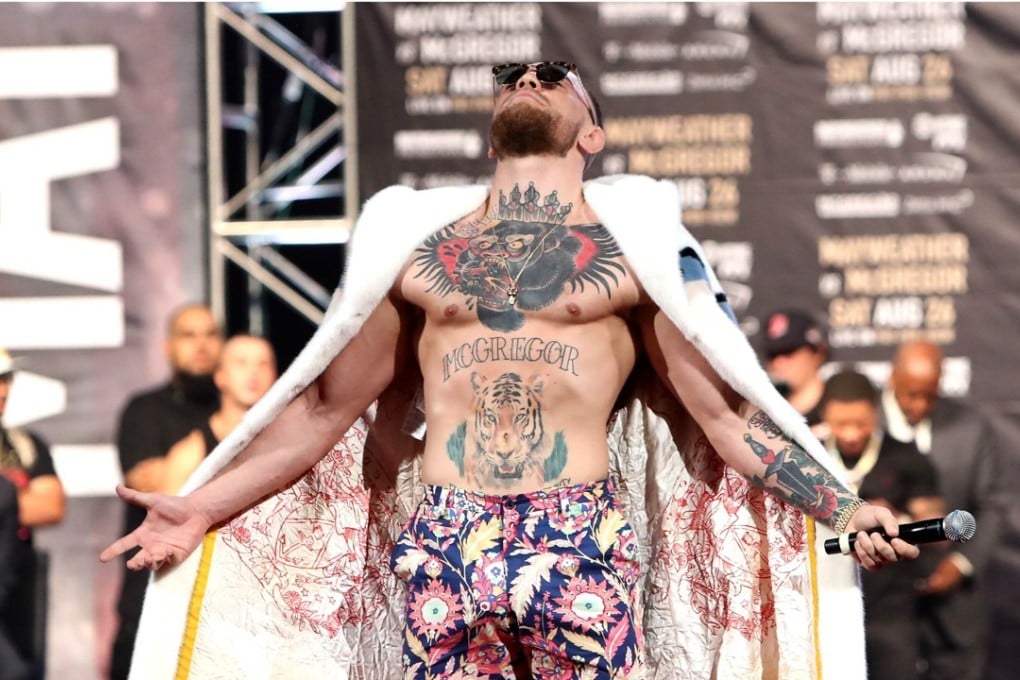 Conor McGregor puts on a show at the World Press Tour event at Barclays Center in Brooklyn, New York. Photo: AFP