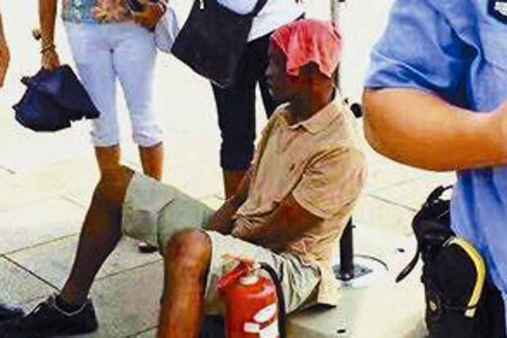 Beijing’s searing heat was all too much for this visitor to Tiananmen Square. Photo: Handout