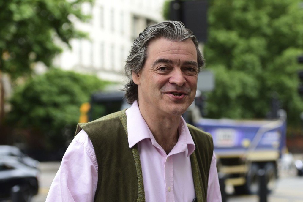 The 4th Viscount St Davids, Rhodri Philipps, arrives at Westminster Magistrates' Court in London, on Thursday, July 13, 2017. The British aristocrat was sentenced to jail for 12 weeks for making online threats to anti-Brexit campaigner Gina Miller. Photo: PA via AP