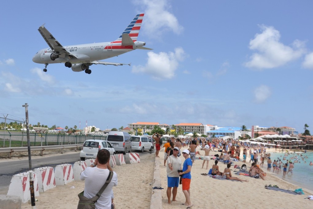A plane landing at the Princess Juliana International Airport in Philipsburg, St Maarten. Photo: AP