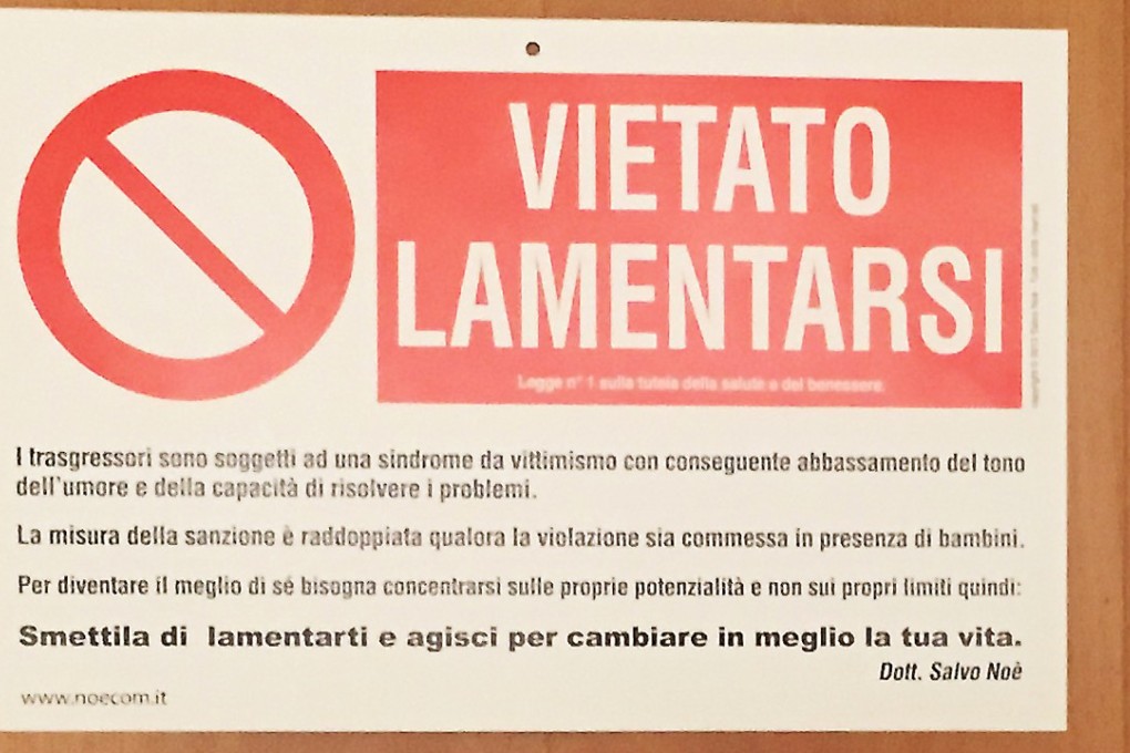 This photograph released by The Vatican Insider - La Stampa newspaper, shows the banner reading " Forbidden to Complain " on the door of the private apartment of Pope Francis at The Vatican on July 12, 2017. Photo: AFP