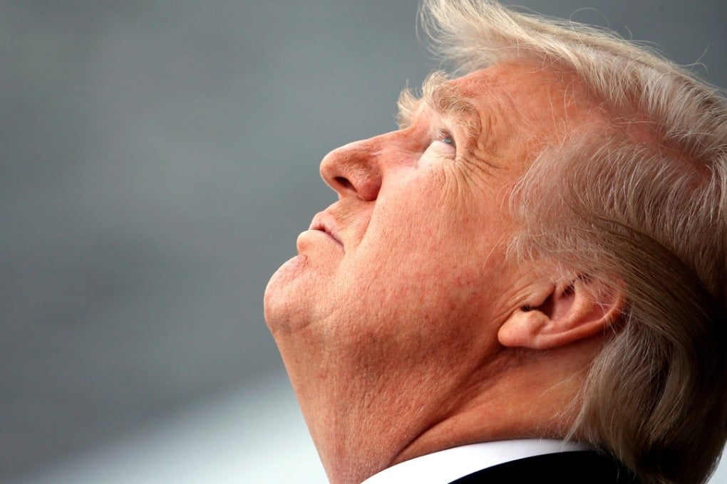US President Donald Trump at the traditional Bastille Day military parade in Paris. Photo: Reuters