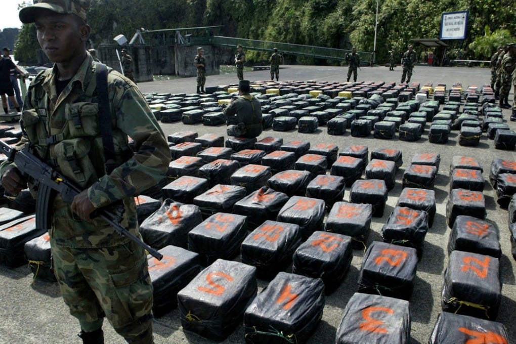 Colombian soldiers present a cocaine seizure. Photo: AFP