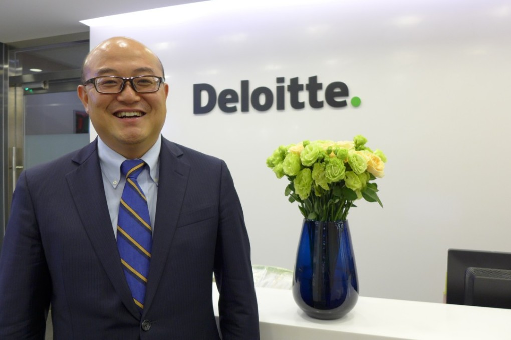 Andrew Zhang Qing says Dalian has already attracted major companies such as Pfizer and HP to set up their business processing units in the city. Photo: Enoch Yiu