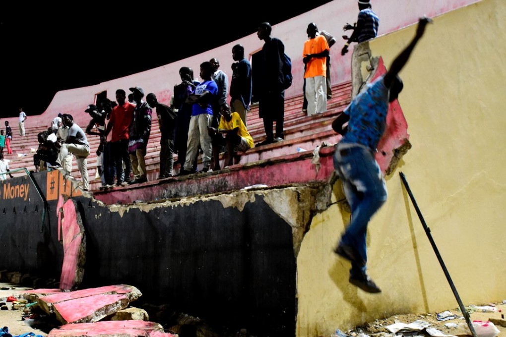 A wall that collapsed at Demba Diop stadium in Dakar after a match between local teams Ouakam and Stade de Mbour. Photo: AFP