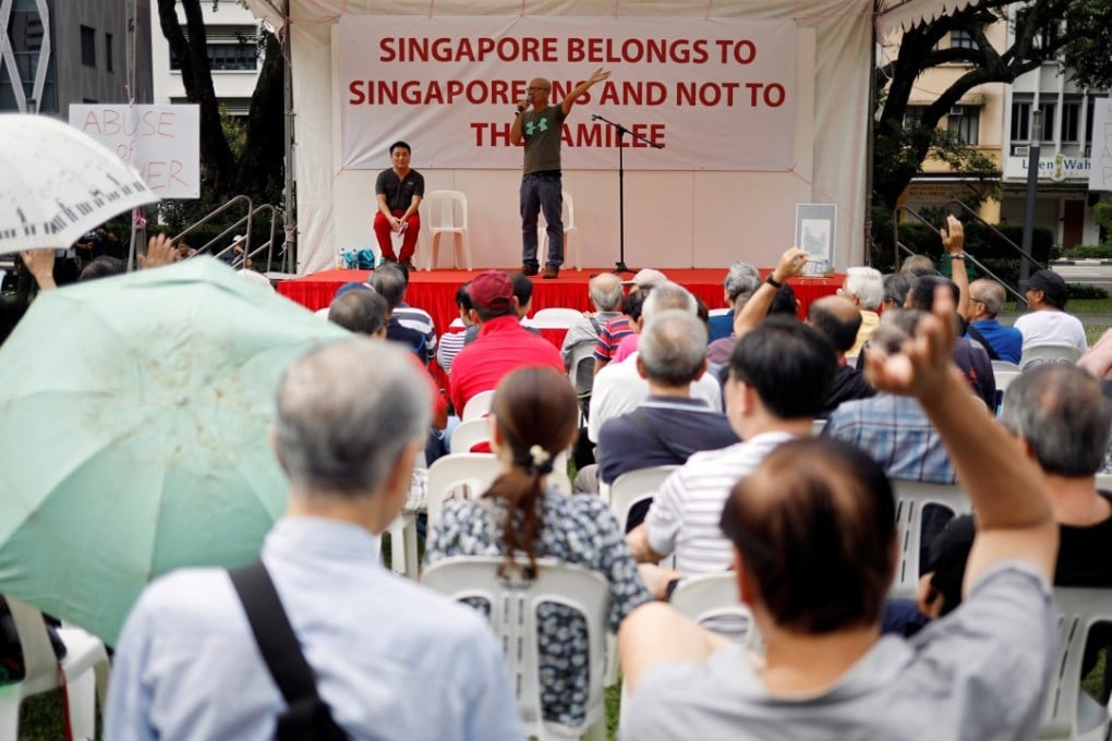 Organiser Gilbert Goh speaks to people at Hong Lim park during the protest. Photo: Reuters