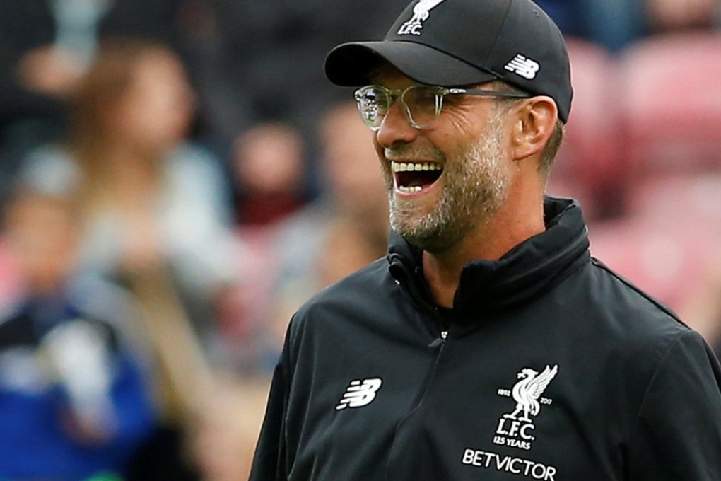 Juergen Klopp watches his team in action against Wigan on Friday. Photo: Reuters