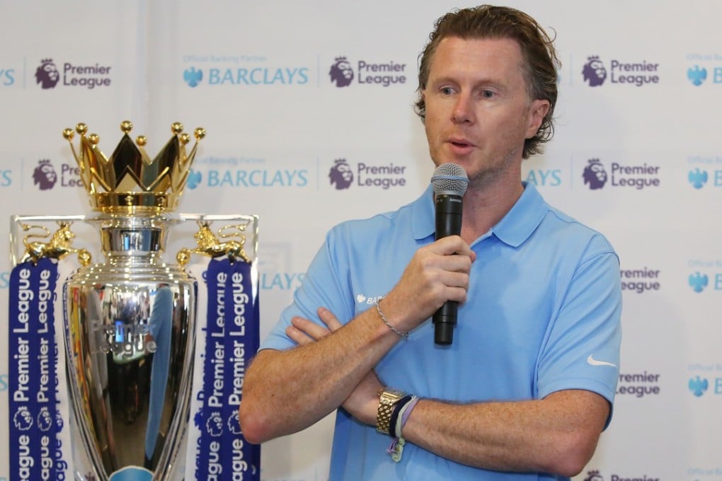 Steve McManaman with the Premier League trophy at a function with Barclays at the South China Morning Post offices in Causeway Bay. Photo: Edmond So