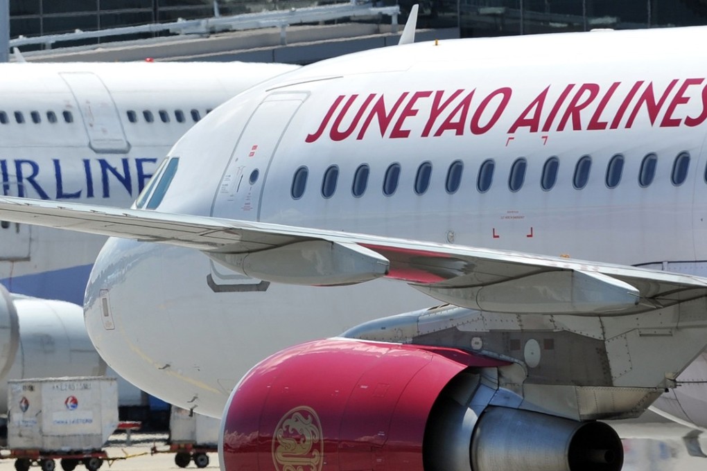 Juneyao Airlines’ Flight 1252 heading for Beijing was delayed for five hours while passengers deplaned and went through security checks again after the ticketless child was discovered. Photo: AFP