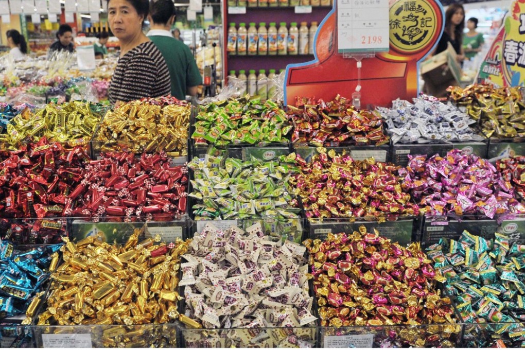 Wahaha heiress Kelly Zong’s aborted acquisition of Hong Kong-listed China Candy sent the penny stock plunging. Photo: EPA