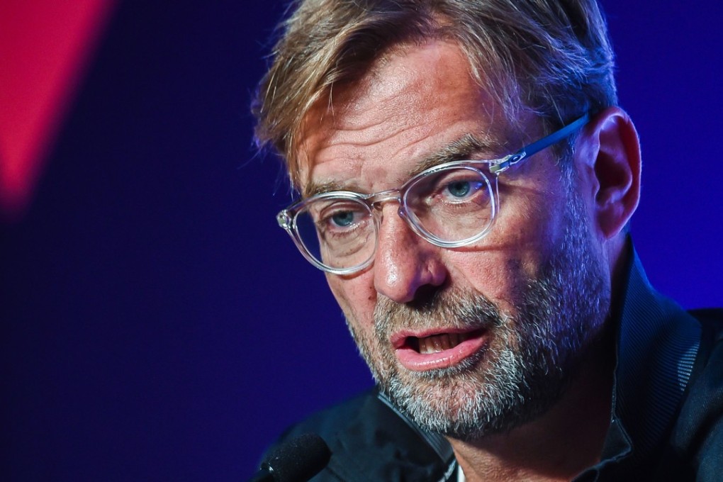 Liverpool football manager Jurgen Klopp speaks at a press conference in Hong Kong on July 18, 2017, ahead of the 2017 Premier League Asia Trophy being played on July 19 and 22. / AFP PHOTO / ISAAC LAWRENCE