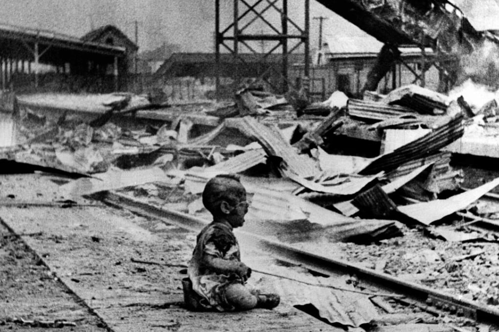 A bloodied child cries in the ruins of Shanghai's South Railway Station after Japanese bombing during the Sino-Japanese War. Photo: AP