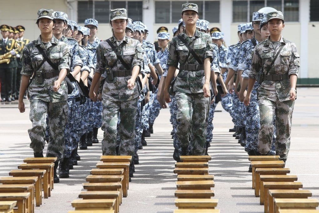 The youngsters get in line at the PLA barracks in Fanling. Photo: Dickson Lee