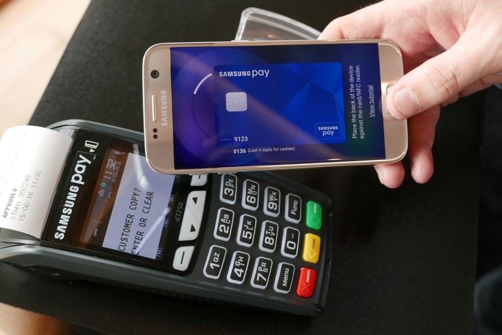 The Samsung Pay mobile wallet system is demonstrated at its Australian launch in Sydney, June, 2016. Photo: REUTERS/Matt Siegel