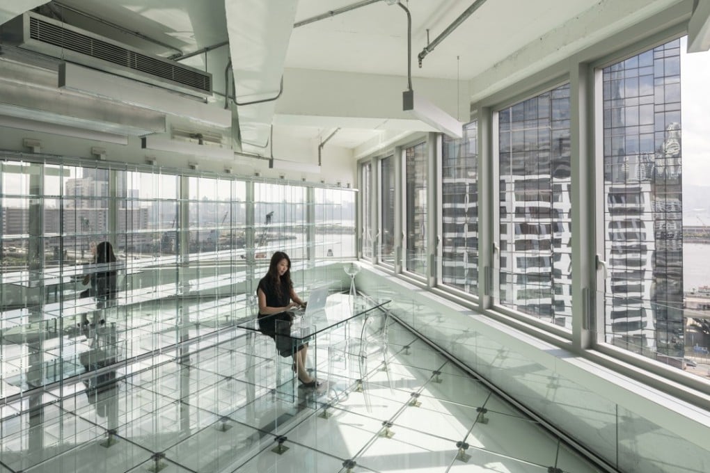 Glass is used throughout the revitalised Cheung Fai Building to bring out the purity of the structure’s design, even down to tables, shelves, floors and walls. Photo: MVRDV Asia