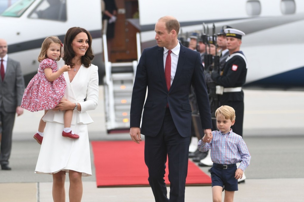 Britain's Prince William, the Duke of Cambridge (R) and his wife Kate, Duchess of Cambridge (L) with their children Prince George and Princess Charlotte arrive at the airport in Warsaw, Poland, on July 17, 2017. The Duke and Duchess of Cambridge are on a first official visit to Poland. Photo: AFP