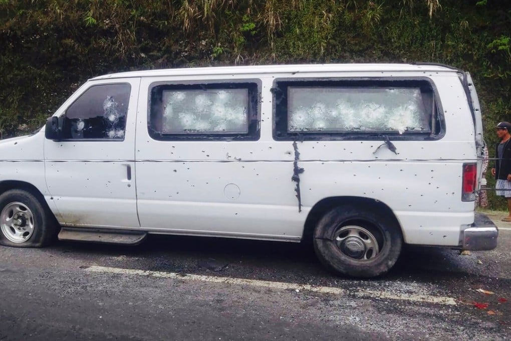 The bullet-riddled van that was ambushed with some members of the Presidential Security Group (PSG) on board. Photo: AFP