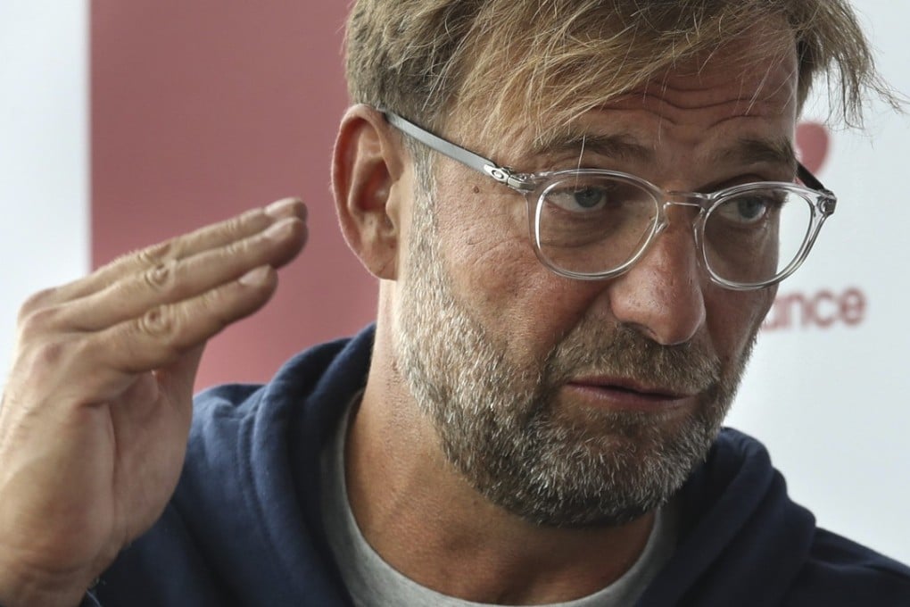 Jurgen Klopp would much rather be drilling his team in Liverpool than flying around the world to Hong Kong, but accepts it’s part of modern football. Photo: Nora Tam