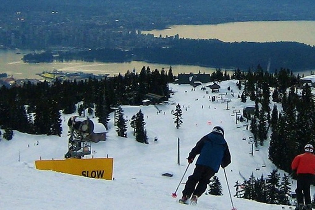 The ski slopes of Grouse Mountain overlook the city of Vancouver below. Photo: Ian Young