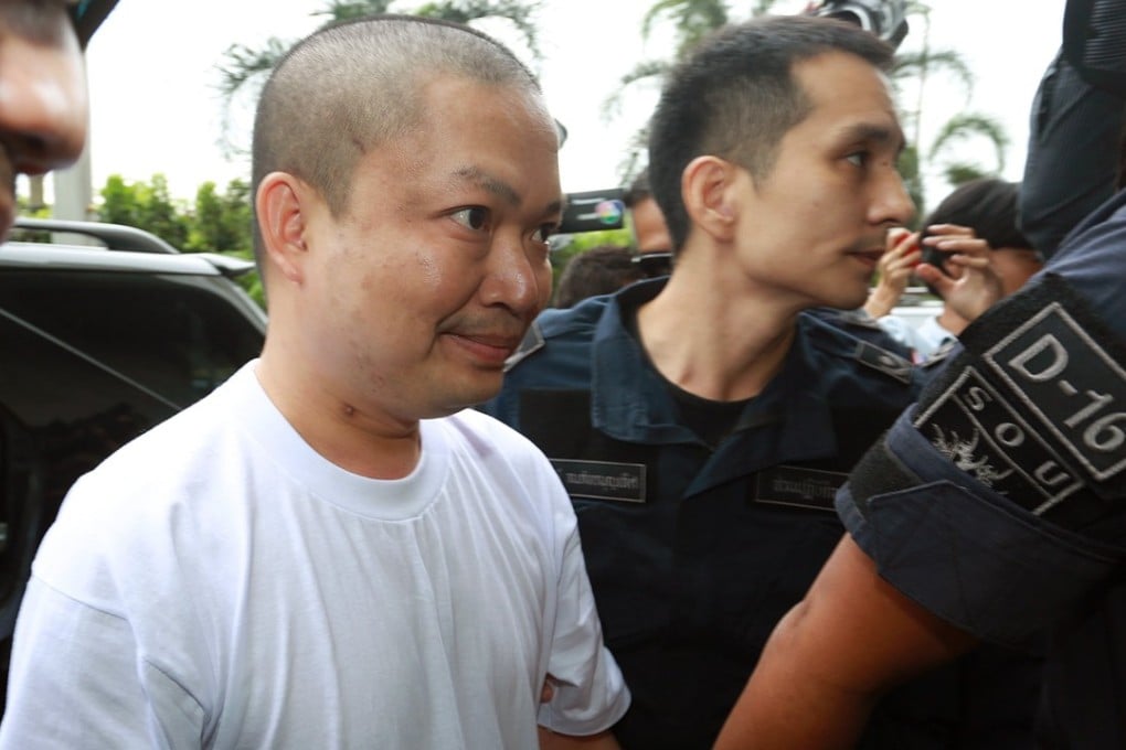 Former Thai Buddhist monk Wiraphon Sukphon, or Nen Kham, arrives at a criminal court in Bangkok. Photo: EPA