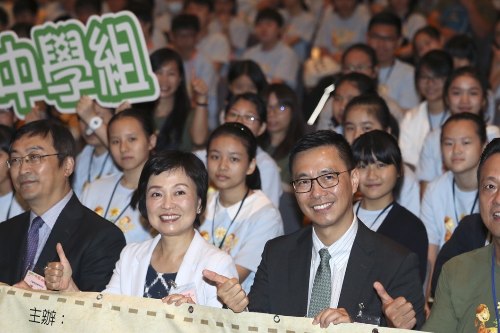 Christine Choi at the book fair on Thursday with education minister Kevin Yeung (second right), Shen Chong (left), director-general of the coordination department of Beijing’s liaison office in Hong Kong, and Yiu Chi-shing, of the Hong Kong Chinese Importers & Exporters Association. Photo: Nora Tam