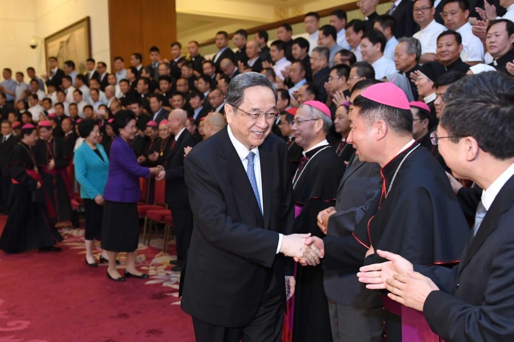 The Communist Party ‘s fourth-ranked member, Yu Zhengsheng, meets leaders of the officially sanctioned Chinese Catholic Patriotic Association in Beijing on Wednesday. Photo: Xinhua