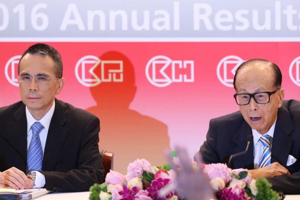 Victor Li Tzar-kuoi and his father Li Ka-shing attend their 2016 annual results at Cheung Kong Center in Central in March. Photo: K. Y. Cheng