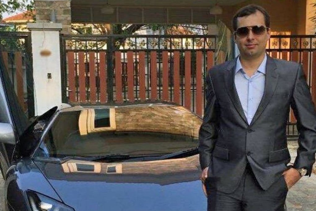AlphaBay founder Alexandre Cazes with one of his luxury cars. Photo: Facebook