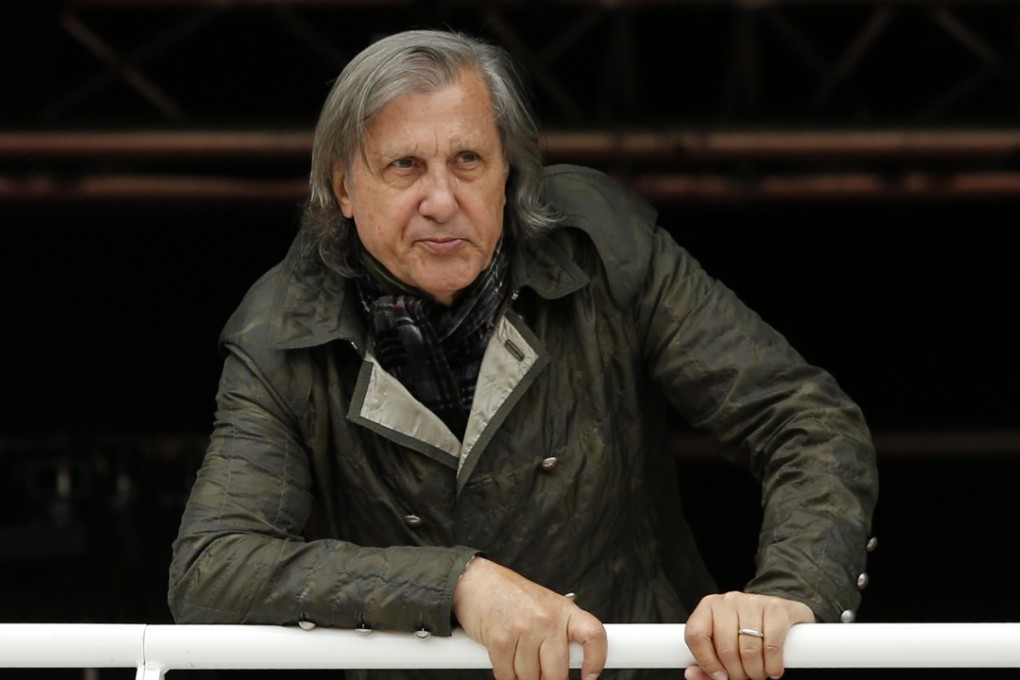 Former Romanian tennis ace Ilie Nastase watches a match of the French Open tennis tournament at the Roland Garros stadium, in Paris, France. Nastase was suspended by the International Tennis Federation for his foul-mouthed outbursts. Photo: AP