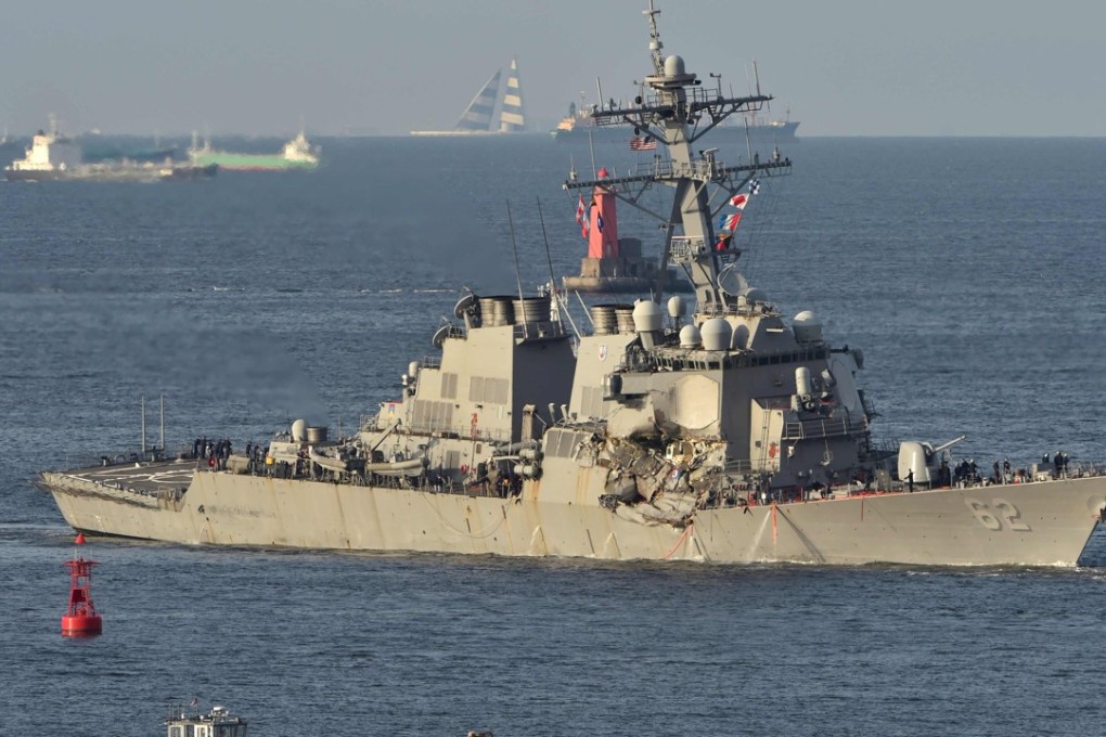 USS Fitzgerald as it sails into its mother port US Naval Yokosuka Base, Kanagawa prefecture. Photo: AFP
