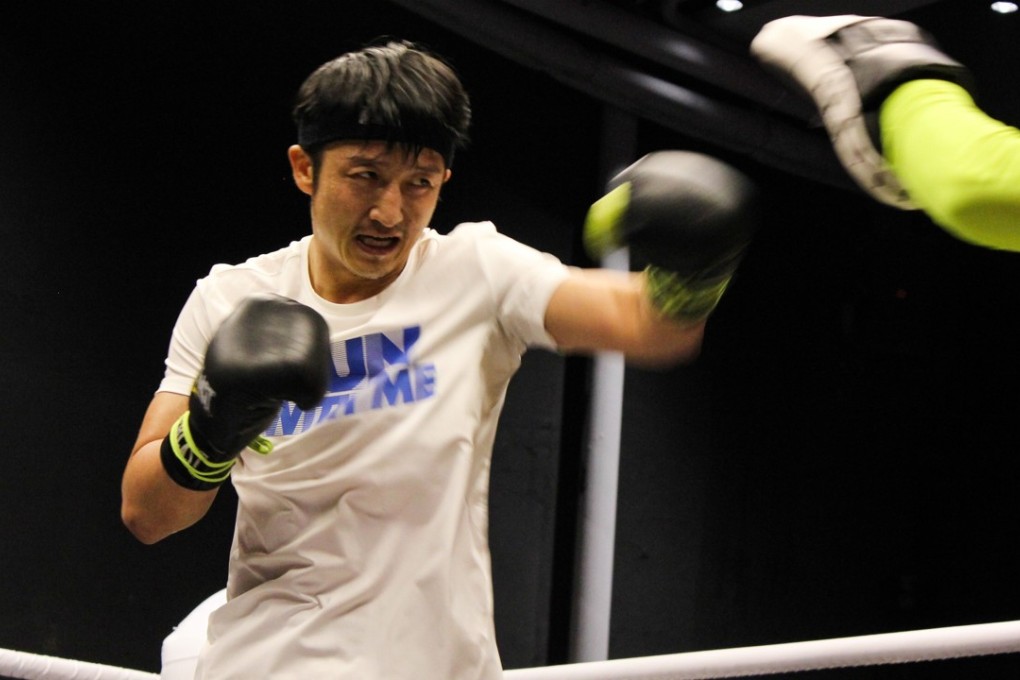 Chinese boxer Zou Shiming trains at a gym in Shanghai in preparation for next week’s WBO flyweight championship. Photos: AFP