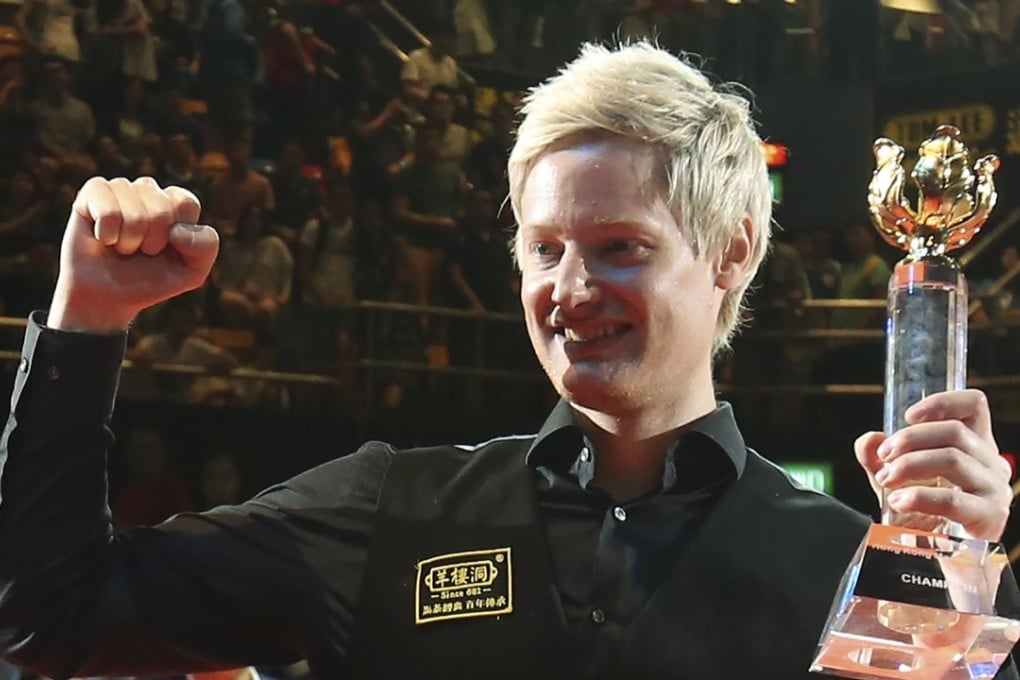 Australia’s Neil Robertson is pumped up as he celebrates his Hong Kong Masters victory. Photo: David Wong