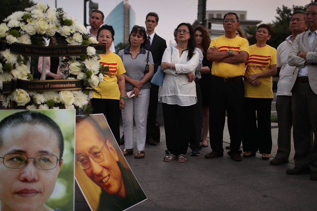 A vigil in memory of Liu Xiaobo in Washington on July 17. Liu, 61, died of multiple organ failure on July 13, while serving a 11-year prison term for the act of inciting subversion of state power. Photo: AFP