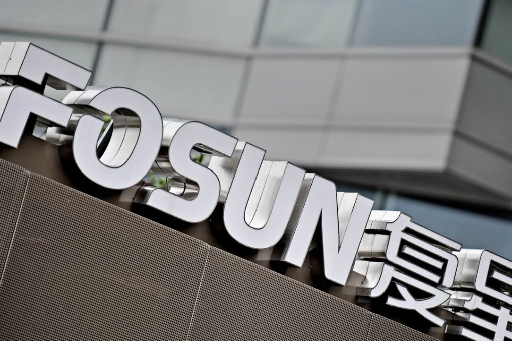 The logo of Fosun Group in front of the company's headquarters building in Shanghai. Photo: AFP