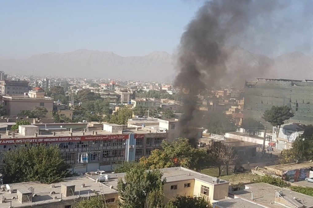 Smoke rises after an explosion near the Zawul Institute of Higher Education in Kabul, scene of a deadly suicide car bombing on Monday, in a still photograph uploaded on social media. Photo: Reuters