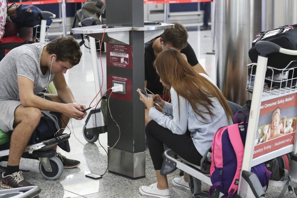 Public Wi-fi users at Hong Kong International Airport. Photo: Nora Tam