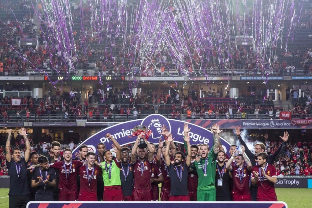 Liverpool FC players celebrate after beating Leicester City in the final of the 2017 Premier League Asia Trophy football tournament at Hong Kong Stadium on July 22, 2017. Photo: AFP