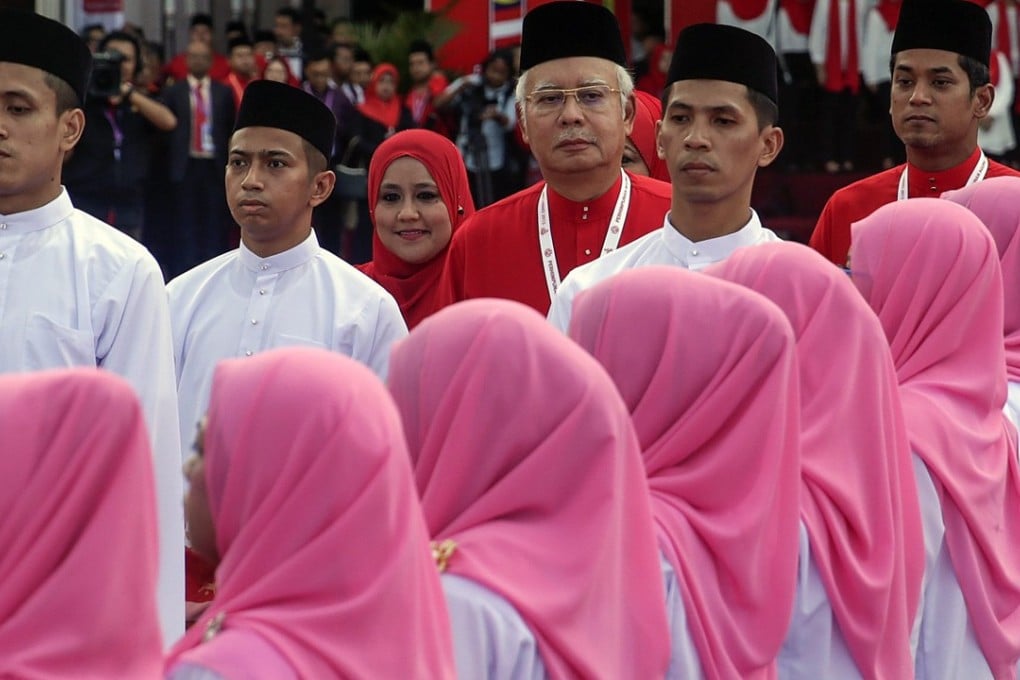 Prime Minister and Umno president Najib Razak (in red) during the opening ceremony of the ruling party’s 69th general assembly in Kuala Lumpur, in December 2015. Photo: EPA