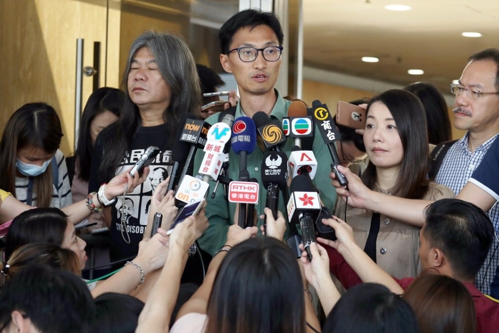 Eddie Chu (centre) arrives at the High Court with disqualified lawmakers Leung Kwok-hung and Lau Siu-lai and serving councillor Fernando Cheung. Photo: Nora Tam