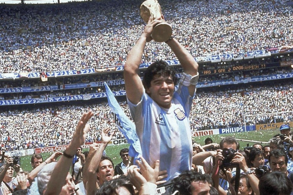 Diego Maradona holds up the World Cup after Argentina defeated West Germany 3-2 in 1986. The soccer legend says he favours the use of video referees, but appreciates the technology didn’t exist in 1986 when he made his famous goal against England using his hand that became known as ‘The Hand of God.’ Photo: AP