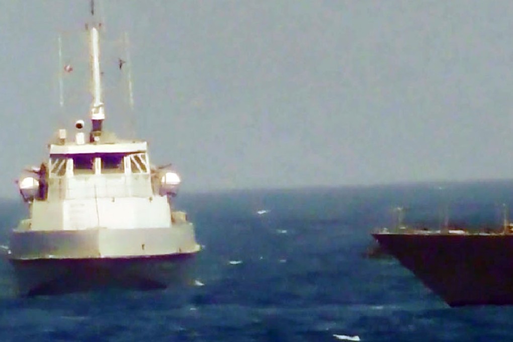 US Navy patrol ship fires warning shots at Iranian vessel in the Gulf ...