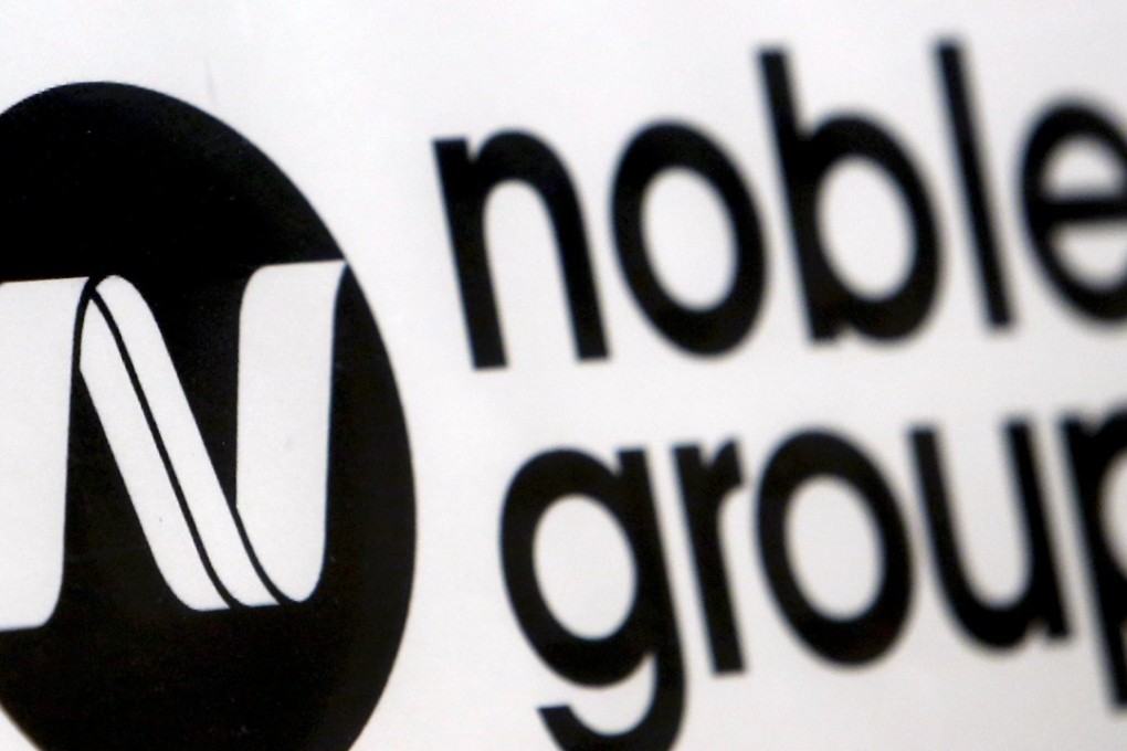 A Noble Group sign is pictured at a meet-the-investors event in Singapore in this August 17, 2015 file photo. Noble Group is shrinking and expects to post a quarterly loss of nearly US$2 billion. Photo: Reuters