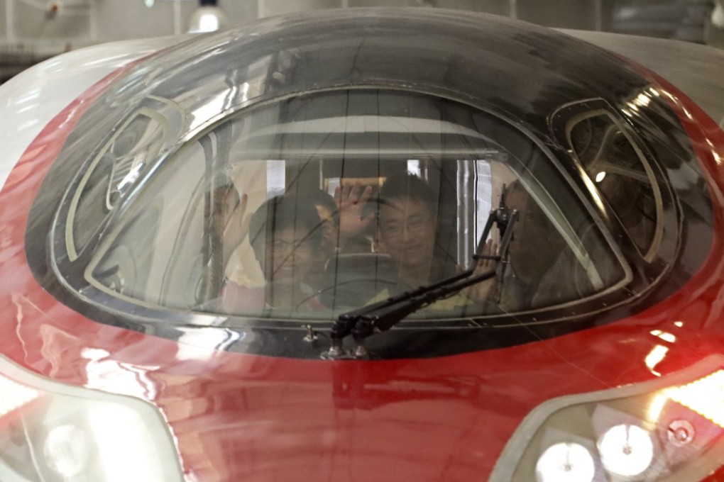 Chief Executive Carrie Lam sits inside a high-speed train in Hong Kong. Photo: Felix Wong