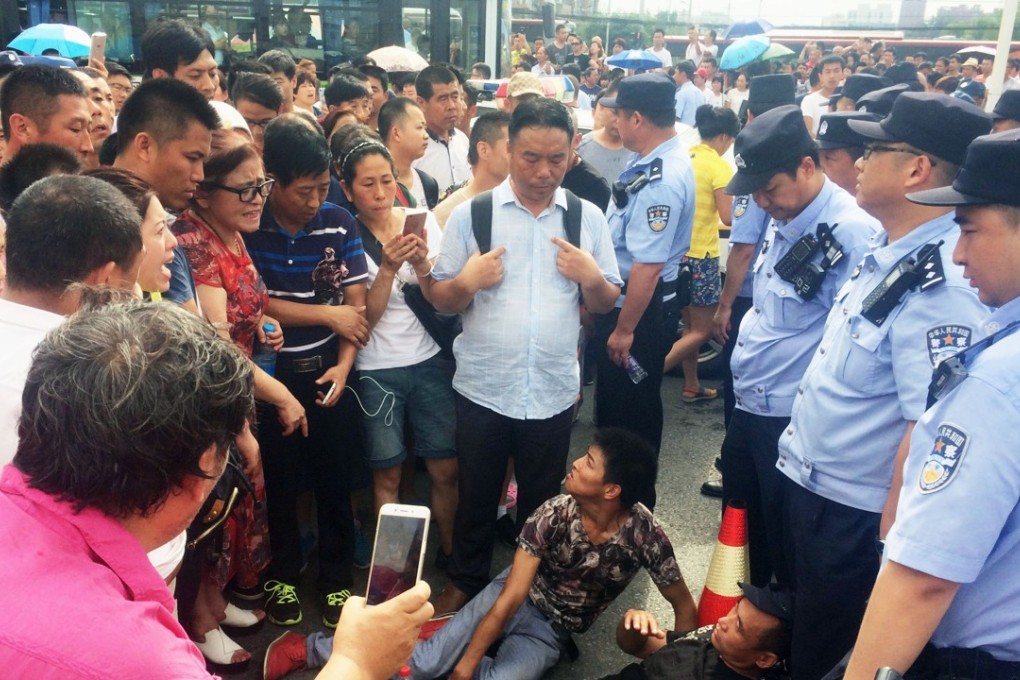 Demonstrators taking part in the protest on Monday. Photo: Kyodo