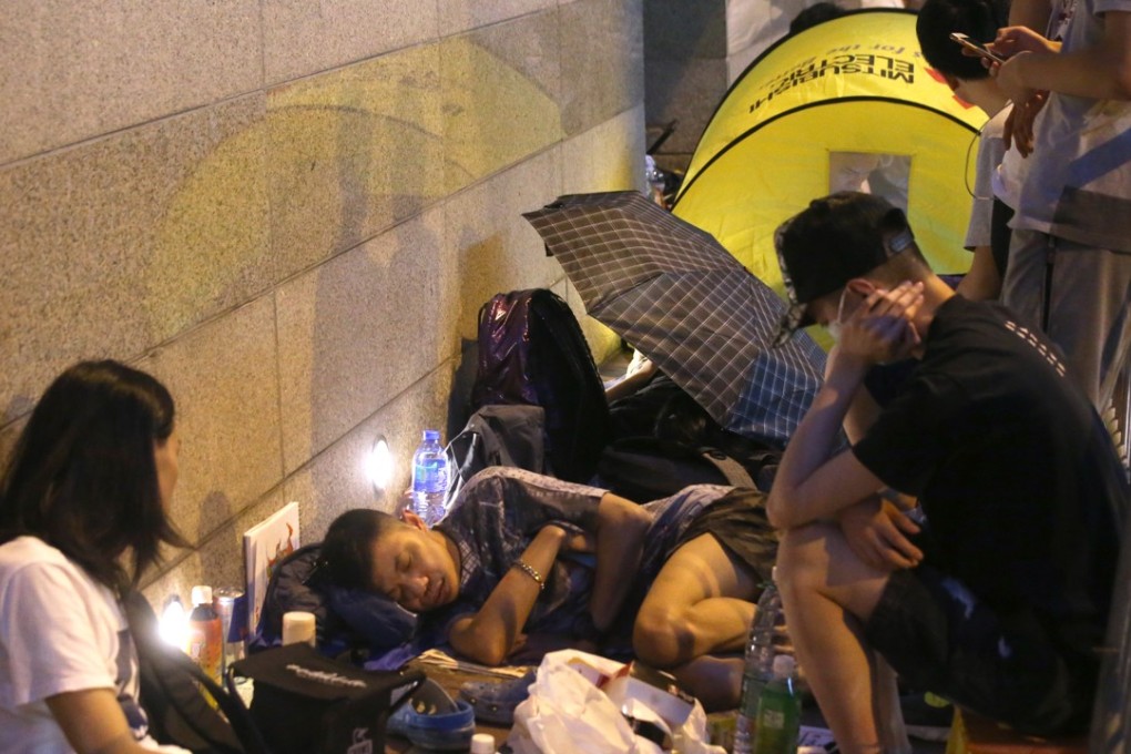 Enthusiasts queue up overnight for the opening of the Ani-Com fair. Photo: K. Y. Cheng