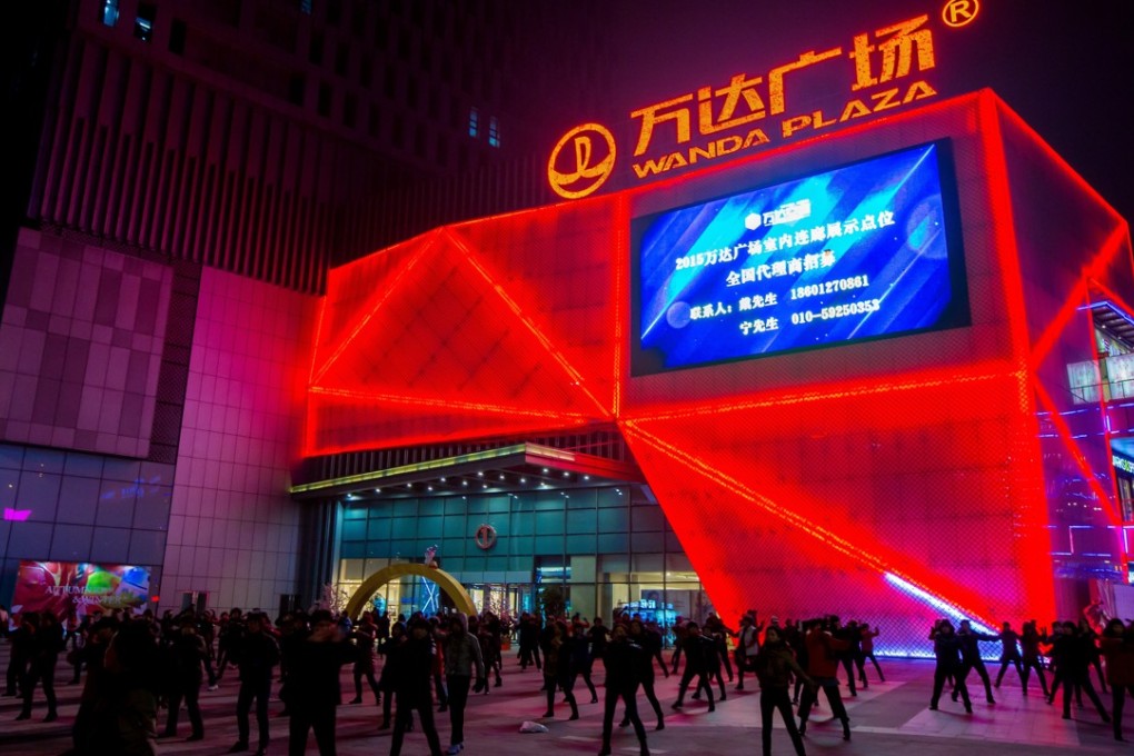 The brights lights that once shone on aggressive and expansionary private conglomerates such as Wanda Group are dimming, as regulators come down harder on their books. Photo: Imaginechina